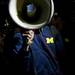 Michigan junior Tim Hardaway Jr. uses a microphone to talk to fans on Sunday, March 31. Daniel Brenner I AnnArbor.com